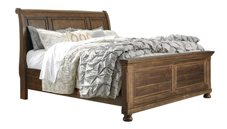 Flynnter Medium Brown Sleigh Platfom Bedroom Set