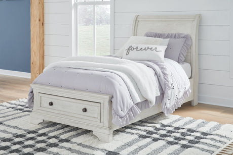 Robbinsdale Antique White Twin Sleigh Storage Platform Bed by Ashley at Eve Furniture