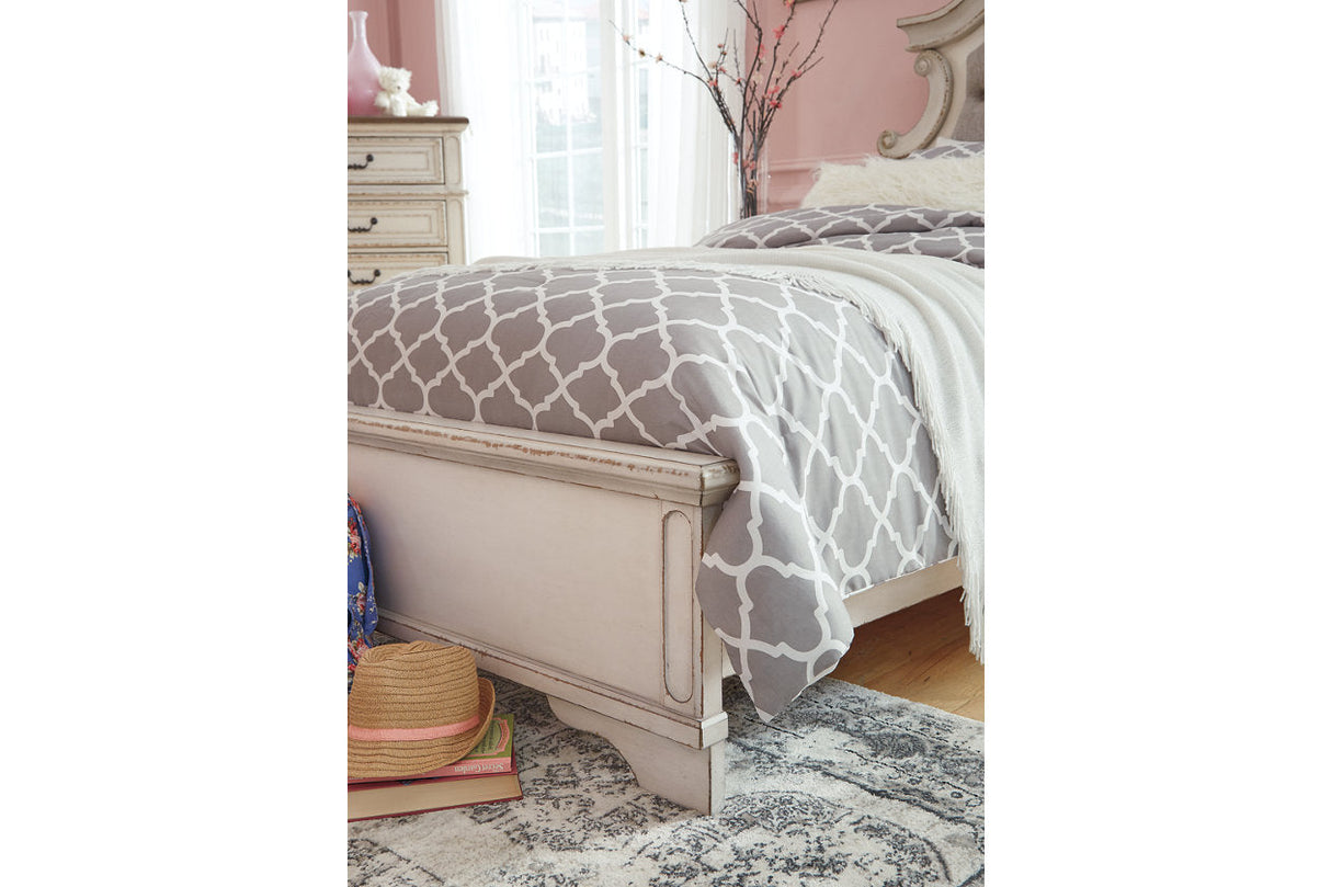 Realyn Chipped White California King Upholstered Panel Bed