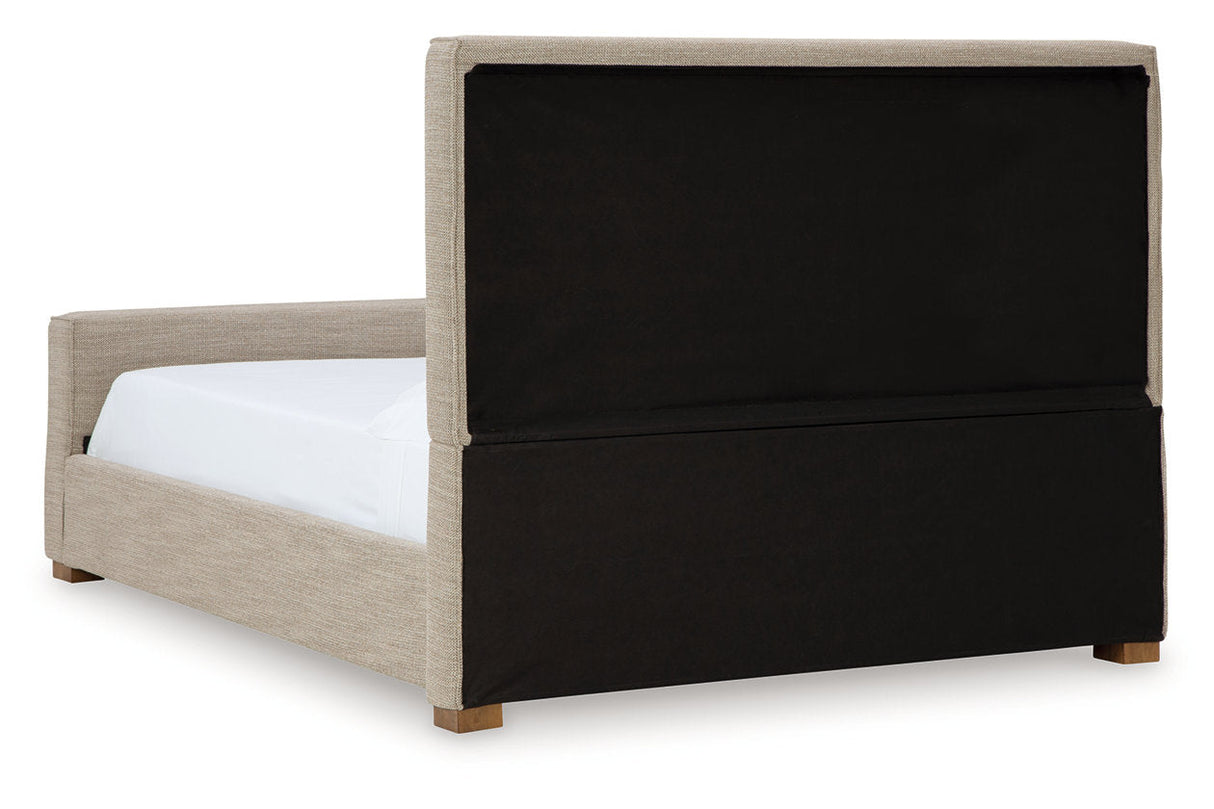 Dakmore Brown Queen Upholstered Bed