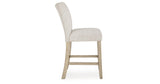 Larawyn Bisque Counter Height Barstool, Set of 2 by Ashley at Eve Furniture