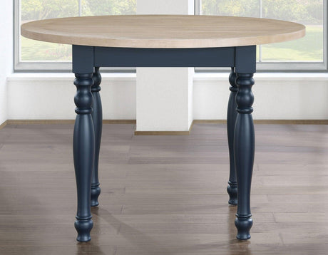 Darcy 42″ Round Dining Table, Midnight Blue and Natural Finish by Steve Silver at Eve Furniture