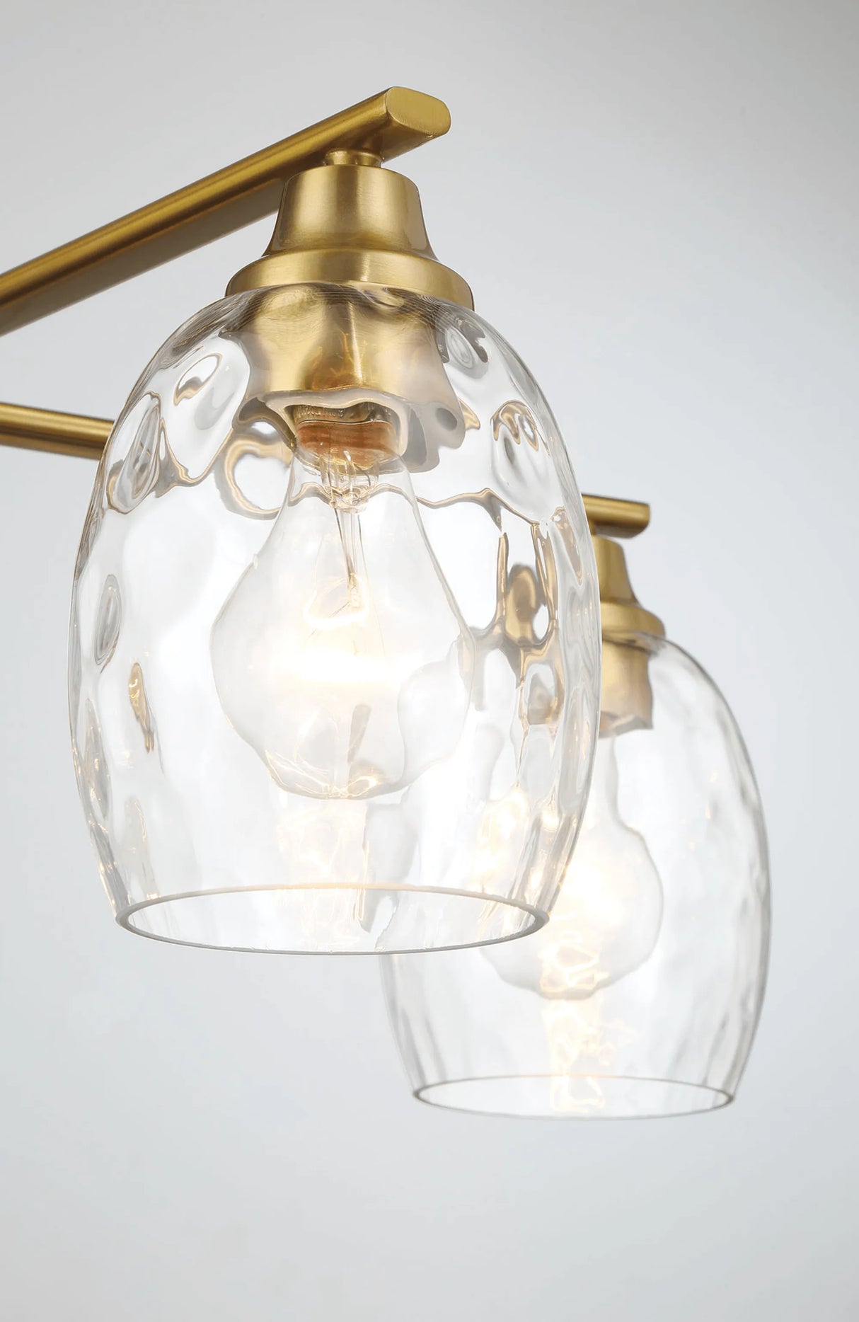 Elegance Five Lights Linear Arms with Golden Brass Finish Chain Chandelier 24"W × 8.5"H with Clear Water Glass by Ashcroft Furniture at Eve Furniture