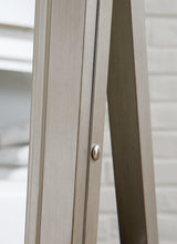 Evesen Champagne Floor Standing Mirror with Storage by Ashley at Eve Furniture