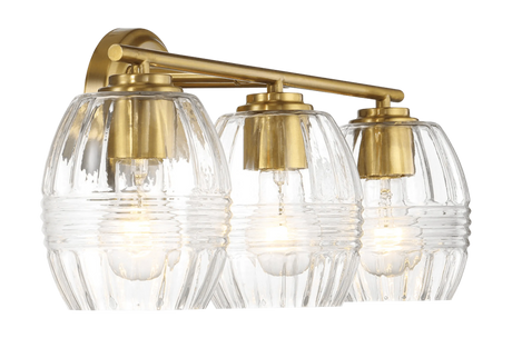 Luster Three Lights Vanity With Clear Glass for Bathrooms above Mirror Wall Lamp - Satin Brass by Ashcroft Furniture at Eve Furniture