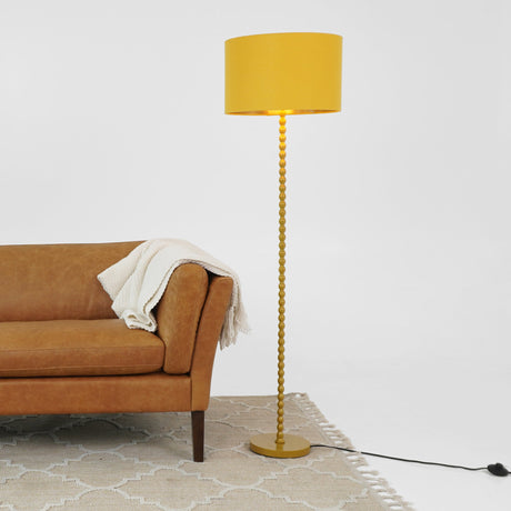 Orbit Floor Lamp Ochre and Gold by Ashcroft Imports at Eve Furniture