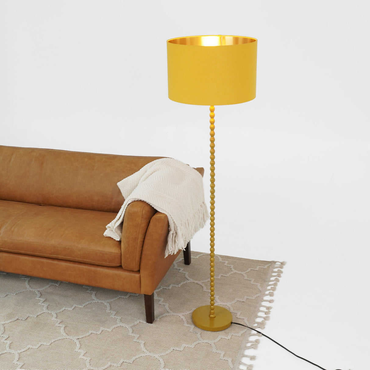 Orbit Floor Lamp Ochre and Gold by Ashcroft Imports at Eve Furniture