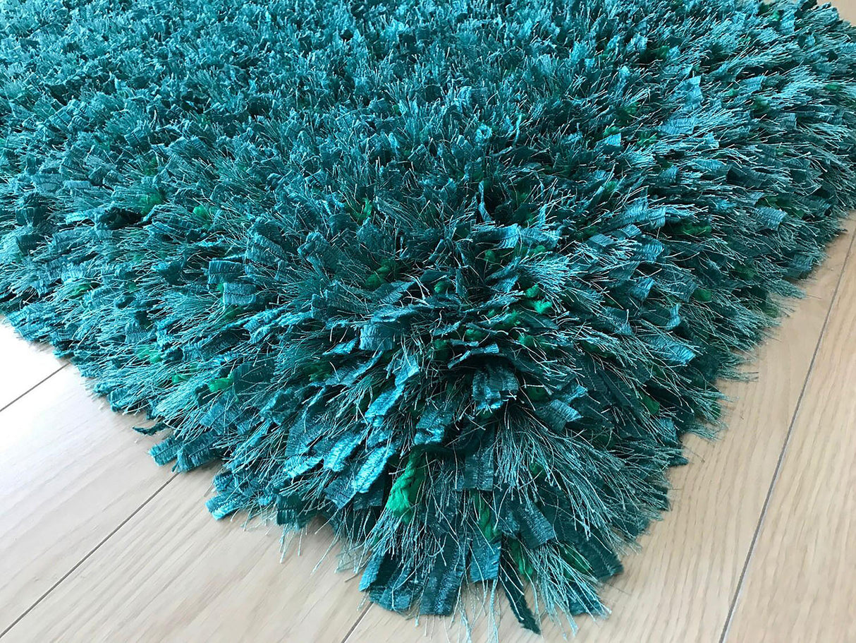 Annmarie Teal 5' X 7' Teal Area Rug