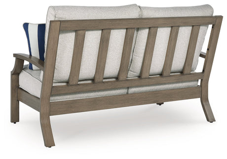 Rainier Ranch Brown/Beige Outdoor Loveseat with Cushion by Ashley at Eve Furniture