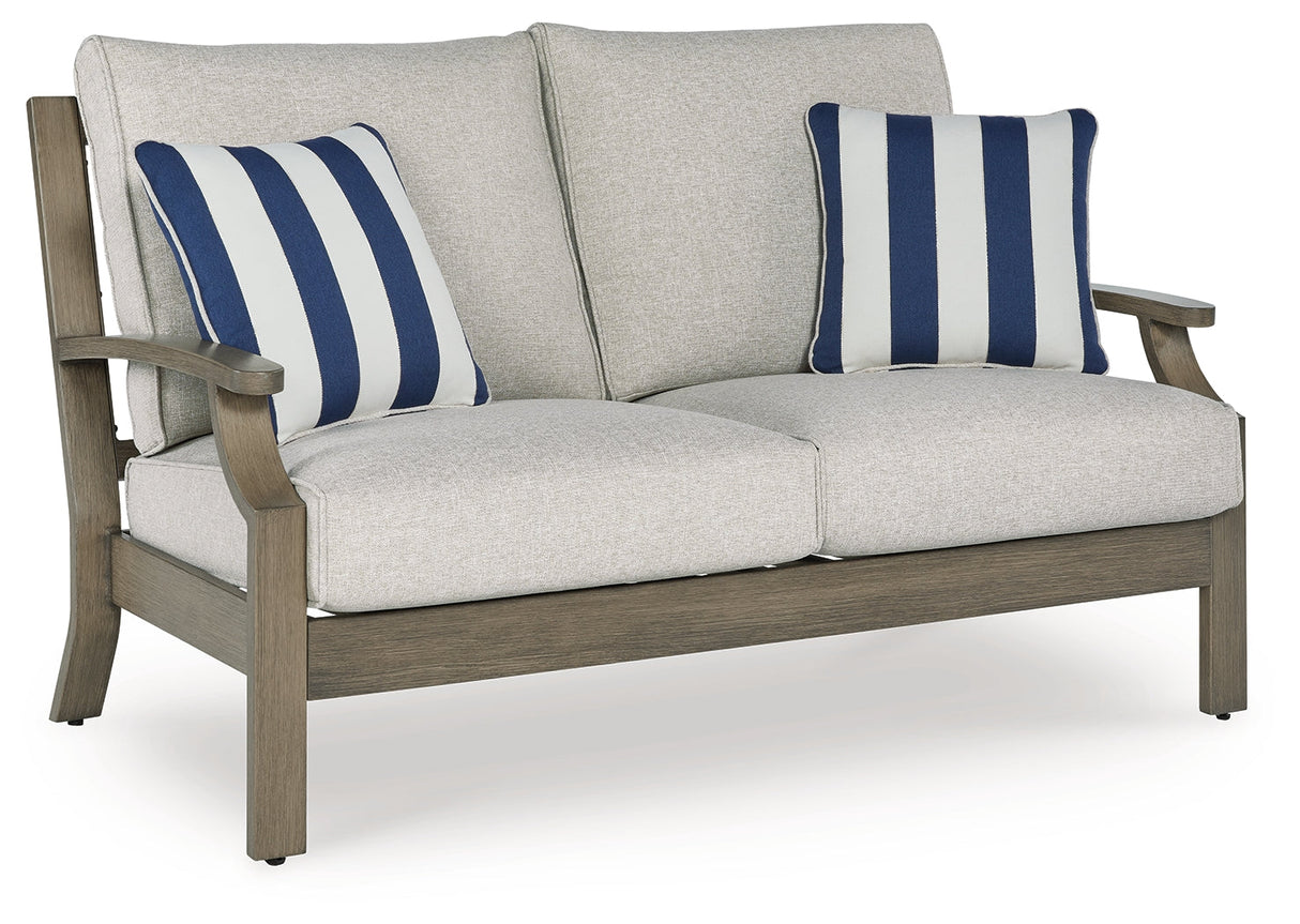 Rainier Ranch Brown/Beige Outdoor Loveseat with Cushion by Ashley at Eve Furniture