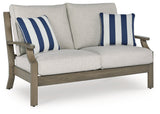 Rainier Ranch Brown/Beige Outdoor Loveseat with Cushion by Ashley at Eve Furniture