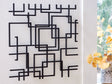 Aadanton Black Wall Decor by Ashley at Eve Furniture