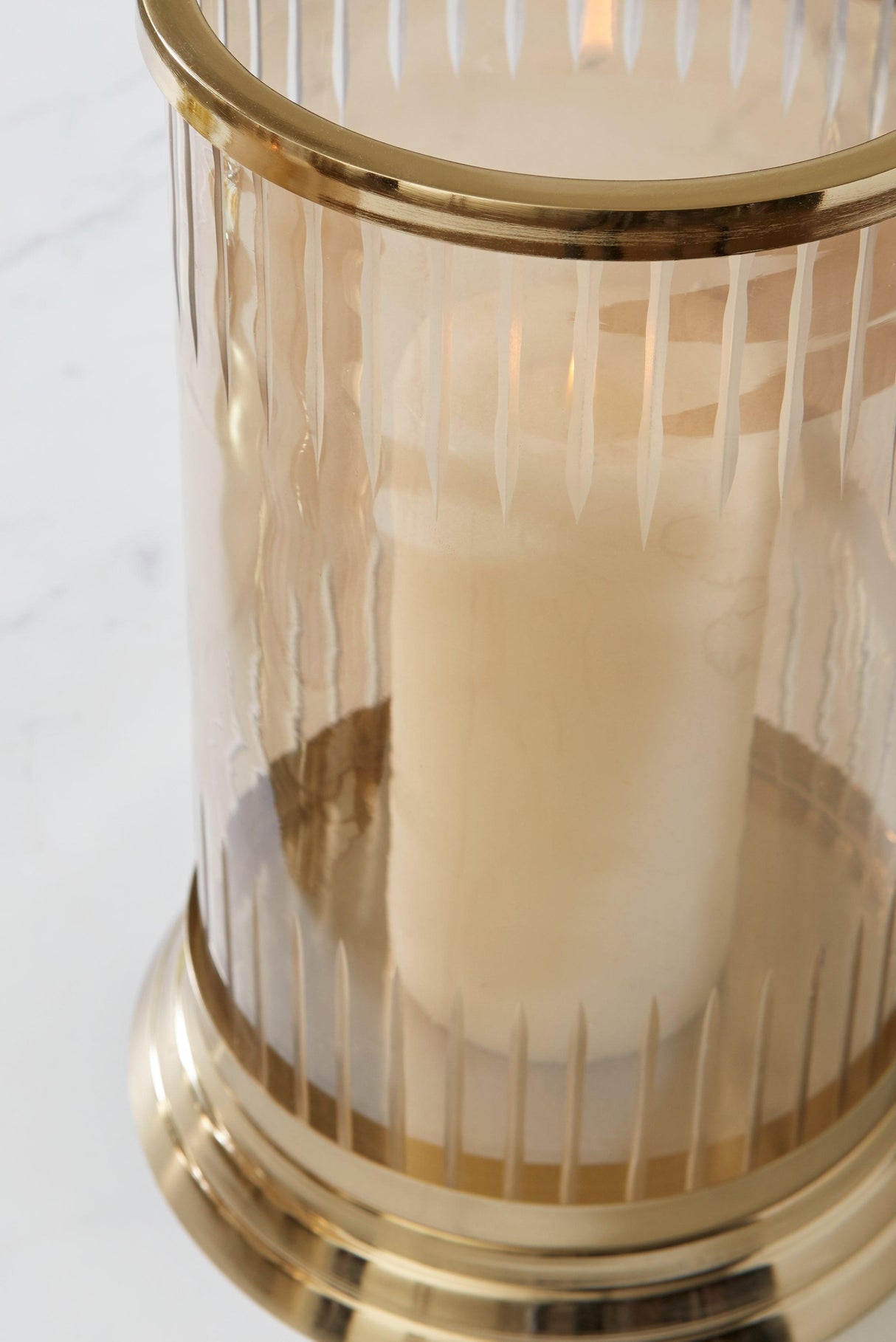 Aavinson Amber/Gold Finish Candle Holder by Ashley at Eve Furniture
