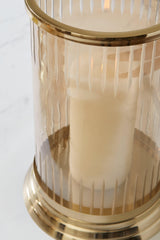 Aavinson Amber/Gold Finish Candle Holder by Ashley at Eve Furniture