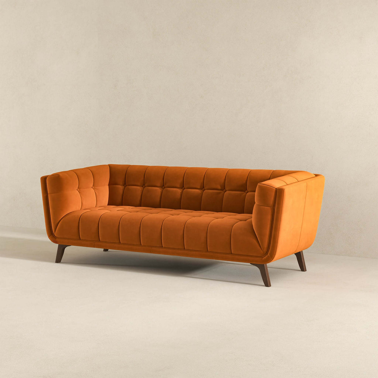 Burnt orange velvet sofa