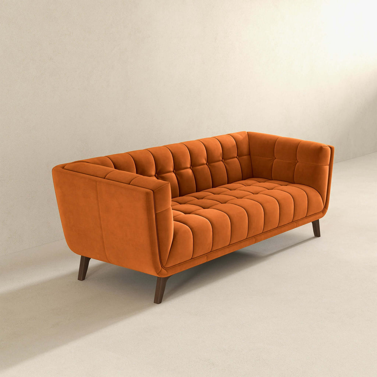 Orange velvet sofa