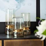 Adriatic I Small Brushed Gold Metal Glass Vase by Mercana at Eve Furniture