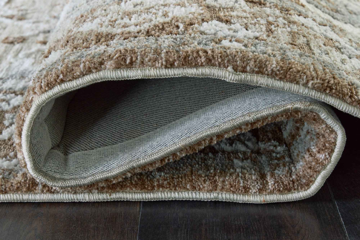 Ainswick Brown/Beige/Gray Memory Foam Medium Rug by Ashley at Eve Furniture