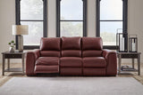 Alessandro Garnet Dual Power Leather Reclining Sofa by Ashley at Eve Furniture