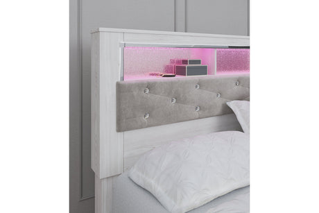 Altyra White King Upholstered LED Bookcase Platform Bed by Ashley at Eve Furniture