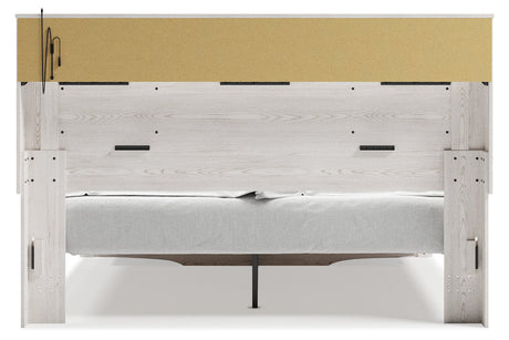 Altyra White King Upholstered LED Bookcase Storage Panel Bed by Ashley at Eve Furniture