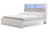 Altyra White King Upholstered LED Bookcase Storage Panel Bed by Ashley at Eve Furniture