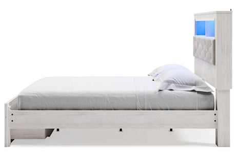 Altyra White King Upholstered LED Bookcase Storage Panel Bed by Ashley at Eve Furniture