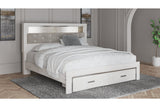 Altyra White King Upholstered LED Bookcase Storage Panel Bed by Ashley at Eve Furniture