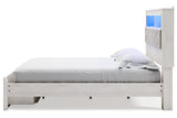Altyra White King Upholstered LED Bookcase Storage Platform Bed by Ashley at Eve Furniture