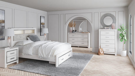 Altyra White LED Bookcase Upholstered Footboard Storage Platform Bedroom Set by Ashley at Eve Furniture