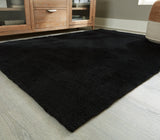 Anaben Black 5' x 7' Rug by Ashley at Eve Furniture