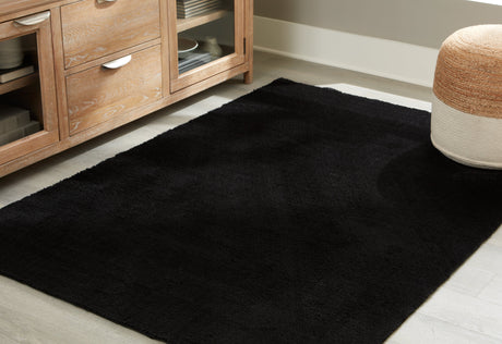 Anaben Black 5' x 7' Rug by Ashley at Eve Furniture