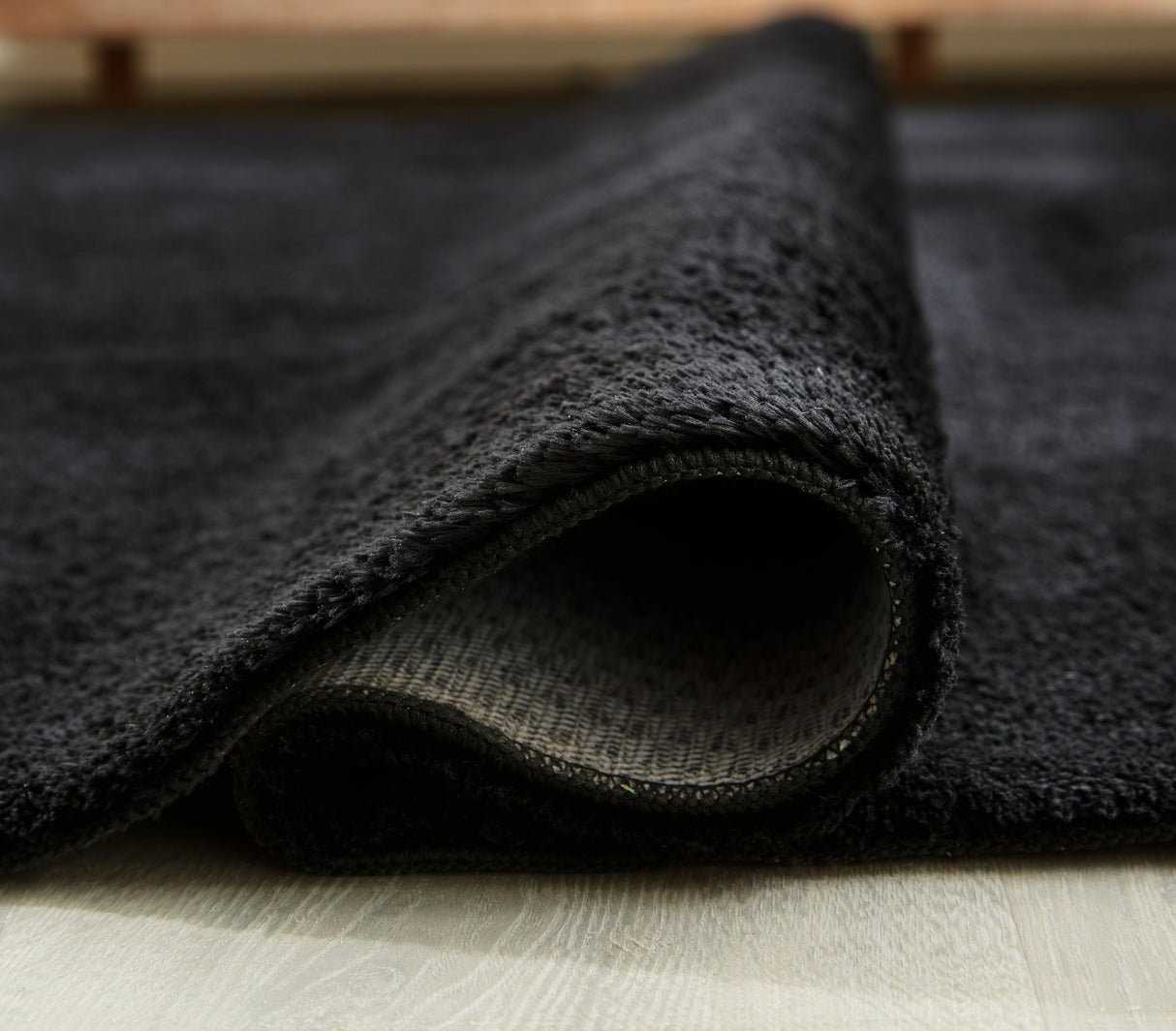 Anaben Black 8' x 10' Rug by Ashley at Eve Furniture