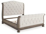Ardenfield Light Brown Queen Upholstered Sleigh Bed by Ashley at Eve Furniture