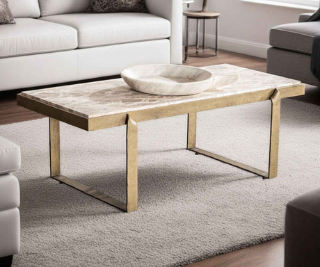 Argos 49" Large Coffee Table with Beige Marble Top and Antique Brass Base by Home Trends & Design at Eve Furniture