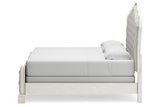 Arlendyne Antique White California King Upholstered Panel Bed by Ashley at Eve Furniture