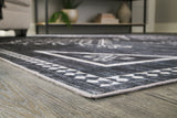Arloman Black/Cream/Gray 5' x 7' Rug by Ashley at Eve Furniture