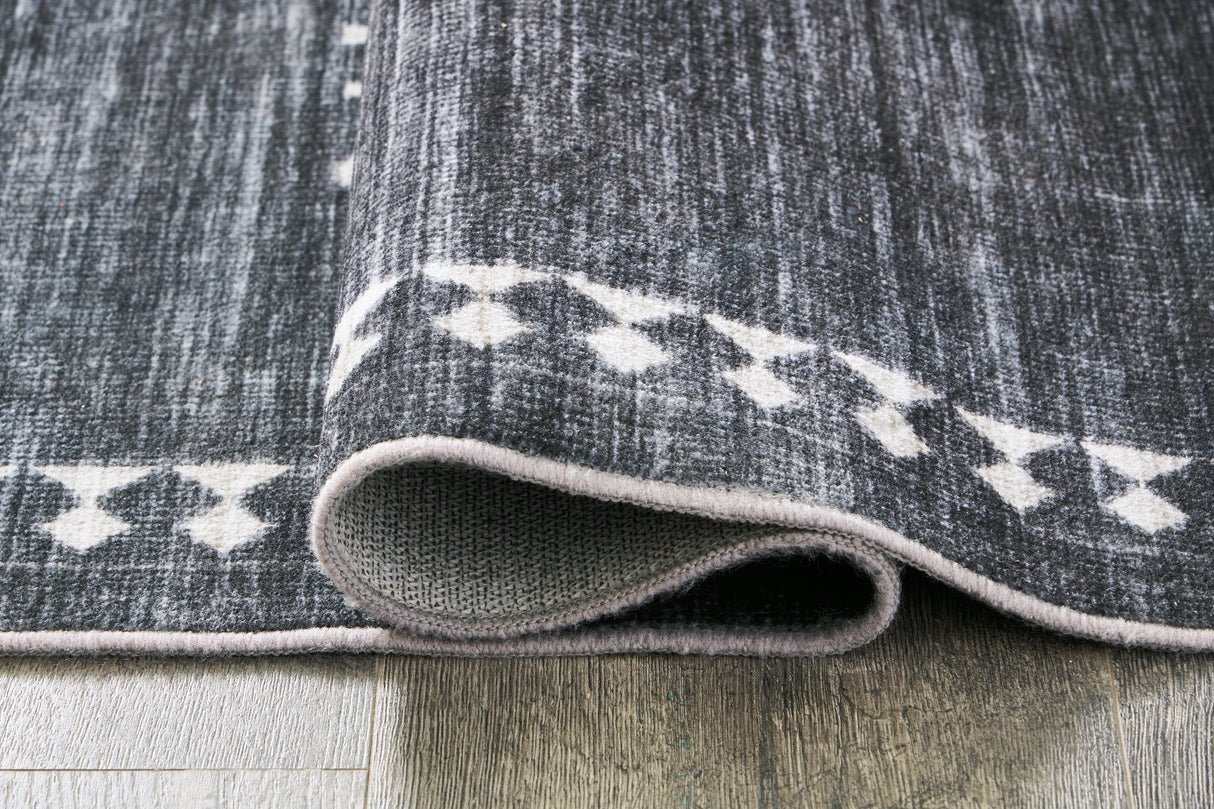 Arloman Black/Cream/Gray 5' x 7' Rug by Ashley at Eve Furniture