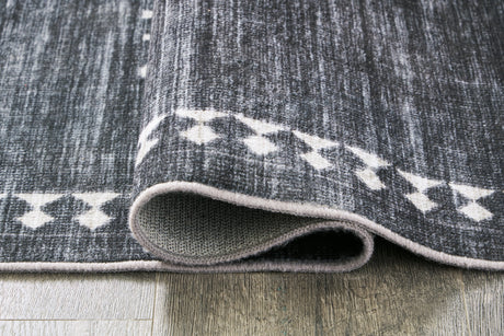 Arloman Black/Cream/Gray 5' x 7' Rug by Ashley at Eve Furniture