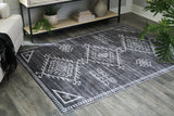 Arloman Black/Cream/Gray 5' x 7' Rug by Ashley at Eve Furniture