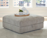 Aslan Court Pebble Ottoman With Storage by Ashley at Eve Furniture