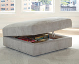 Aslan Court Pebble Ottoman With Storage by Ashley at Eve Furniture