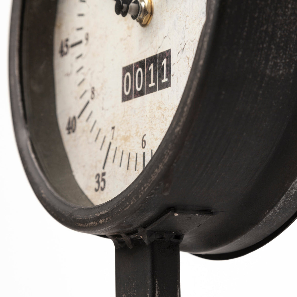 Attalack II Black Metal Round Face Table Clock by Mercana at Eve Furniture