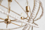 Ava White Gold Metal and White Wood Beaded Six Bulb Chandelier by Mercana at Eve Furniture