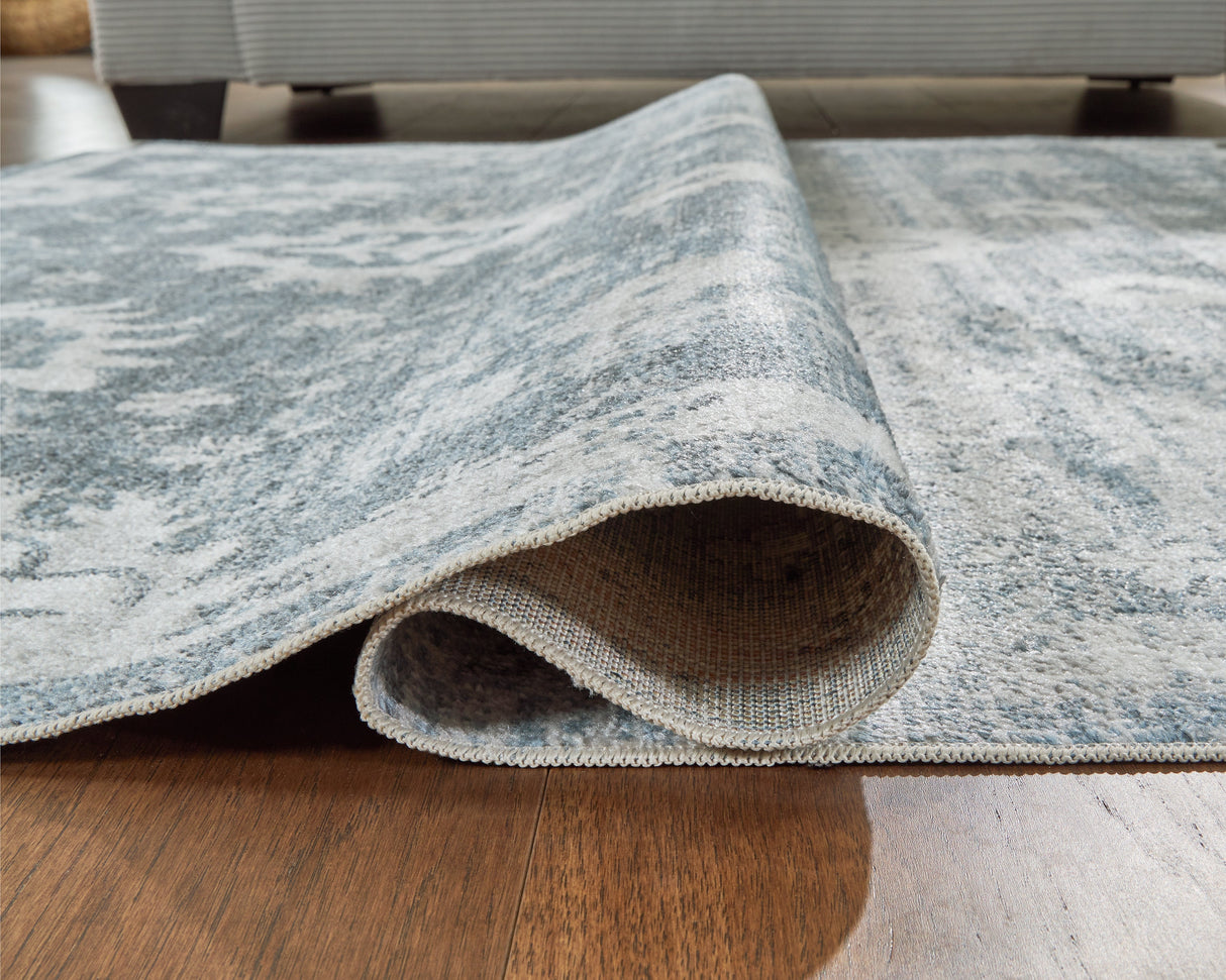 Avanworths Blue/Gray/Ivory Washable Large Rug by ASHLEY FURNITURE at Eve Furniture