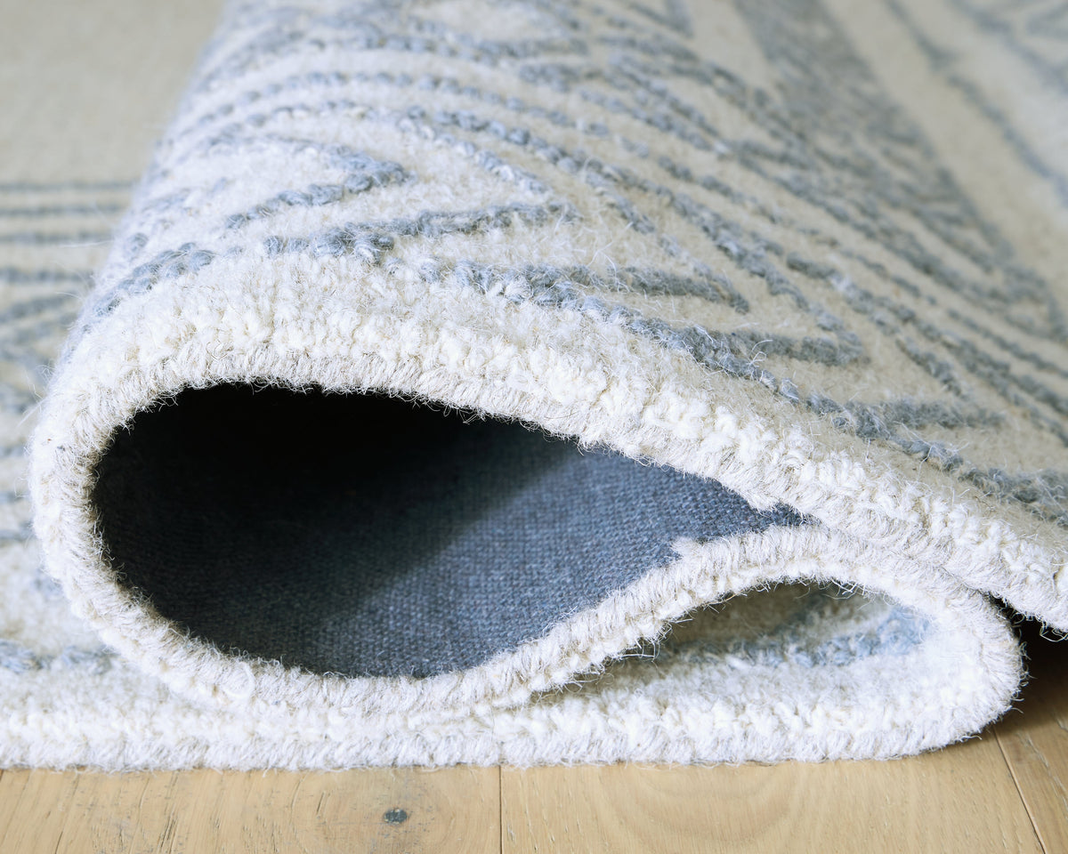 Azelhurst Blue/Ivory/Gray Large Rug by Ashley at Eve Furniture