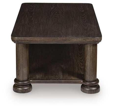 Bannette Dark Brown Coffee Table by Ashley at Eve Furniture
