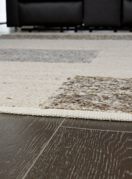 Barus Beige/Brown/Gray 5' x 7' Rug by Ashley at Eve Furniture
