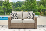 Beachcroft Beige Outdoor Loveseat with Cushion