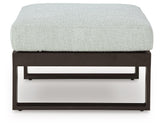 Beachloft Black/Gray Outdoor Ottoman with Cushion by Ashley at Eve Furniture